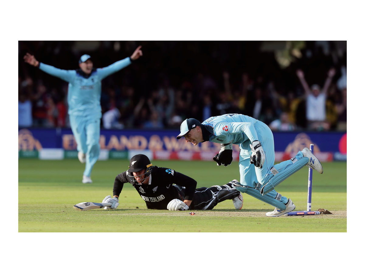 Guptill only a yard away from making his crease as Jos Buttler takes his wicket