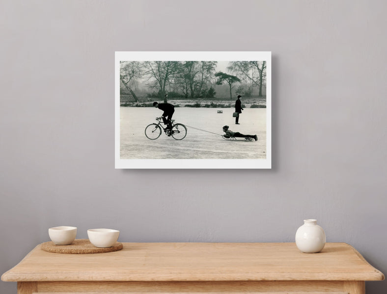 Playing on a frozen pond, Wimbledon Common, 1970