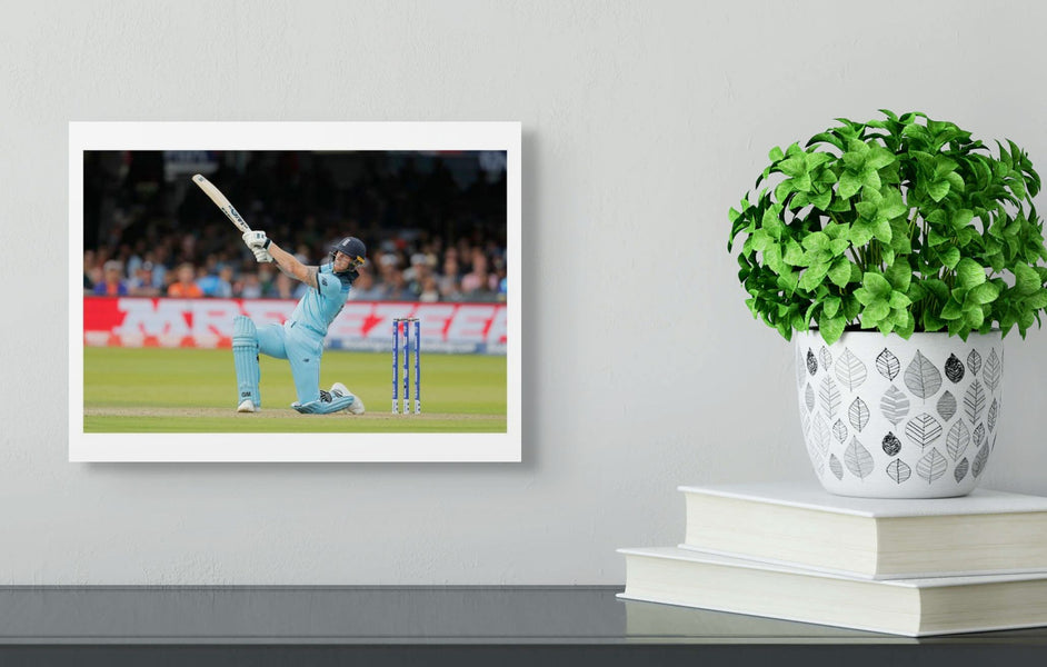 Ben Stokes hits it over mid wicket for six