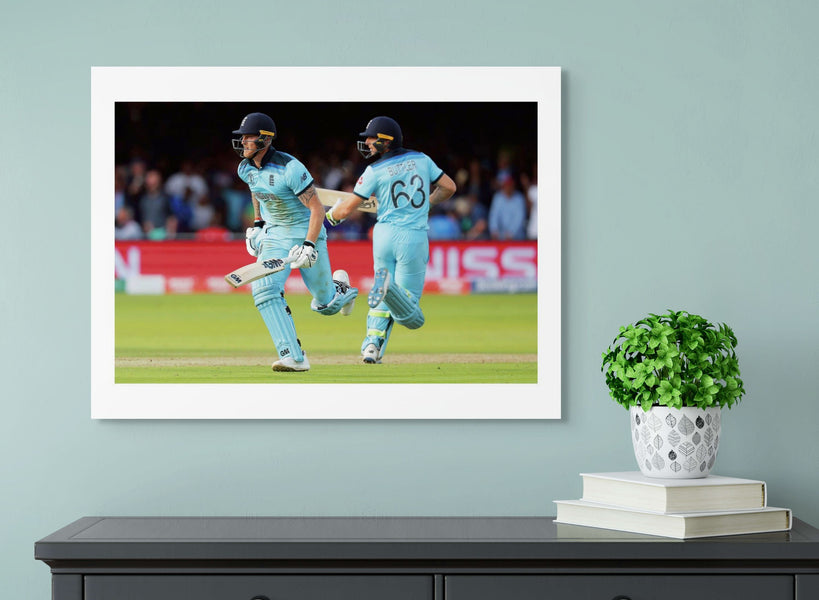 Ben Stokes and Jos Buttler run between the wickets during the super over