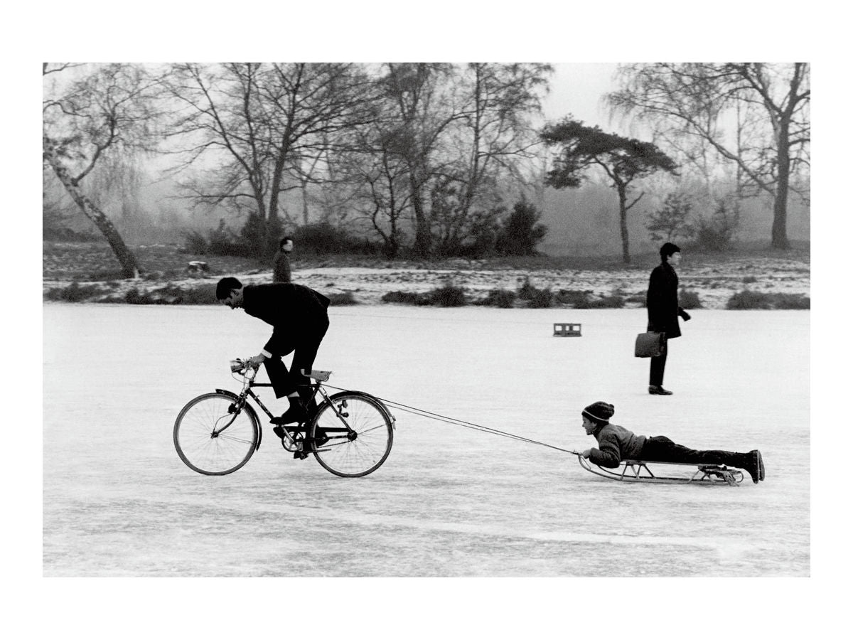 Playing on a frozen pond, Wimbledon Common, 1970