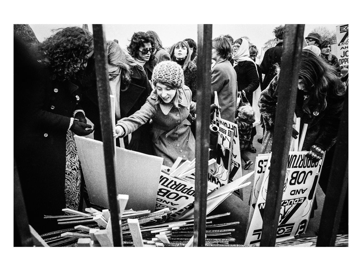 Placards are collected before the start of the march, 1971